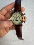 Sea-Gull ST19 moon phase chronograph in hand, bronze-tone case with cream guilloche dial and brown leather strap