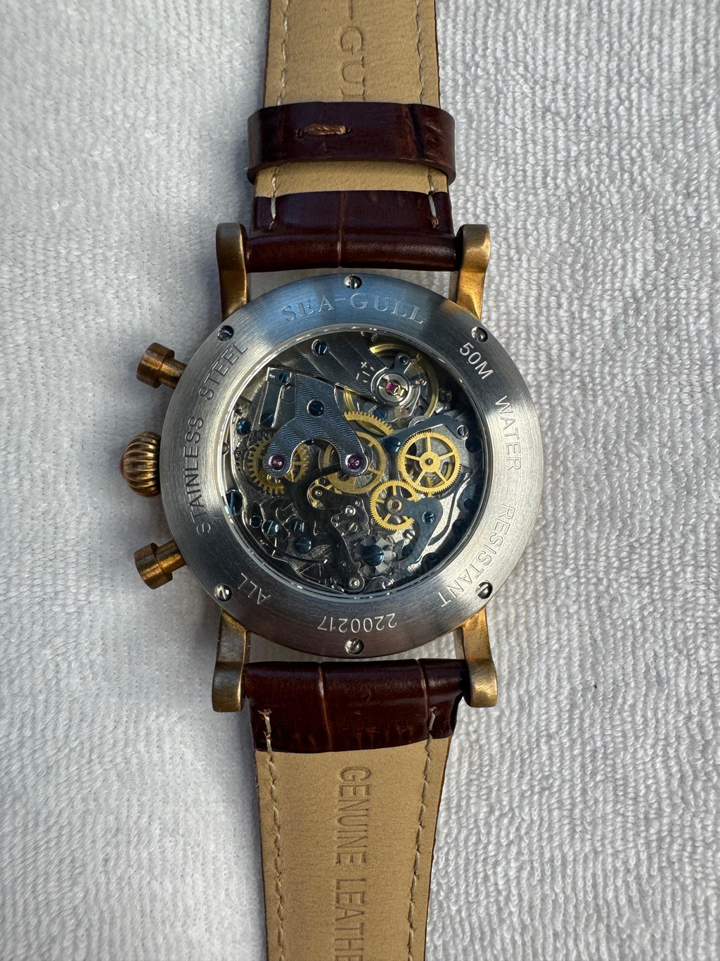 Stainless steel exhibition caseback showing the hand-wound Sea-Gull ST19 column-wheel chronograph movement