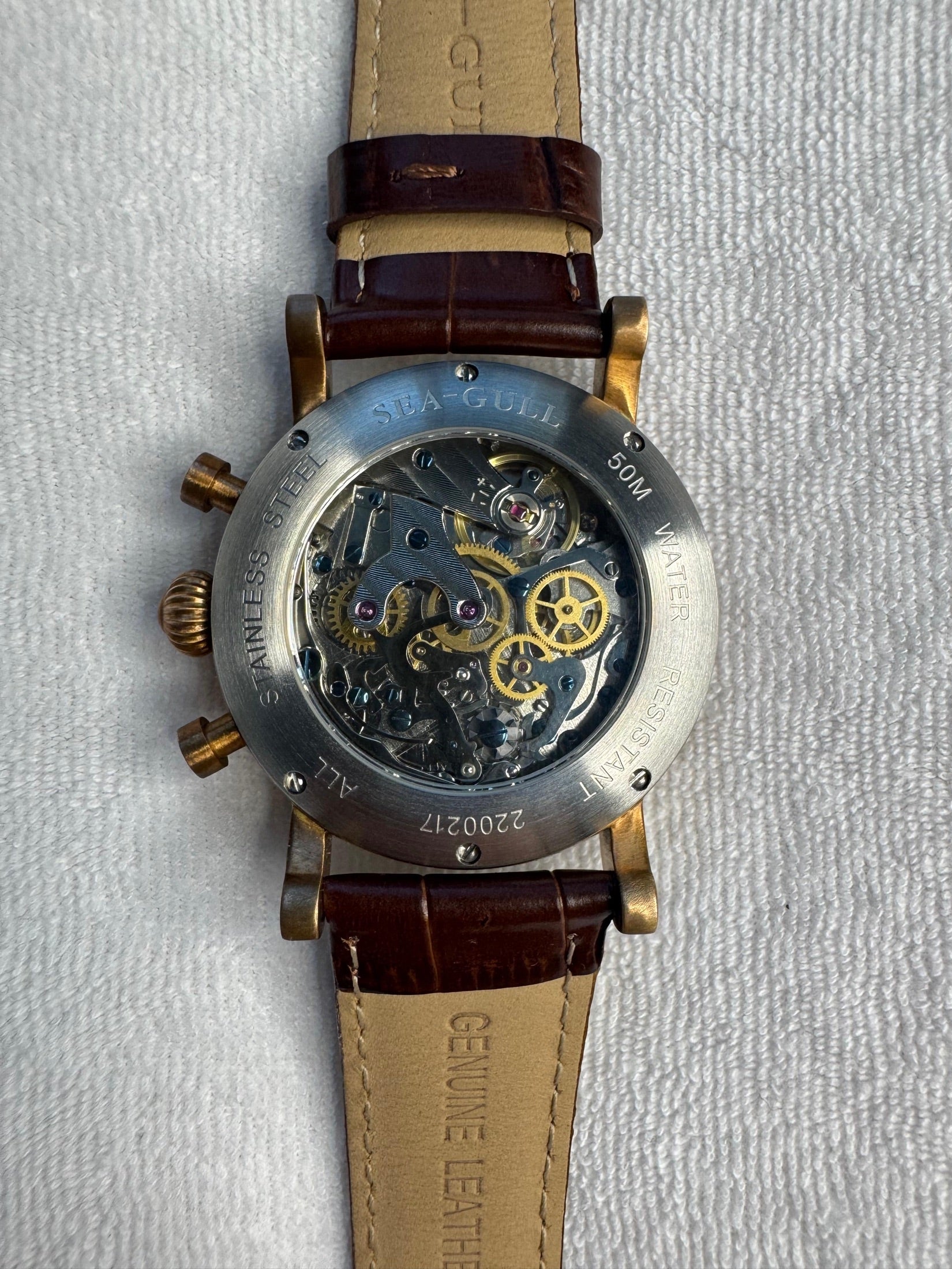 Stainless steel exhibition caseback showing the hand-wound Sea-Gull ST19 column-wheel chronograph movement